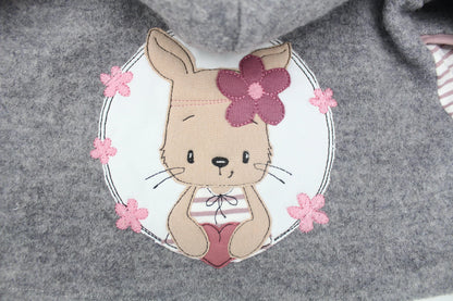Walkjacke in Rosa für Babys mit individueller Applikation und Taschen