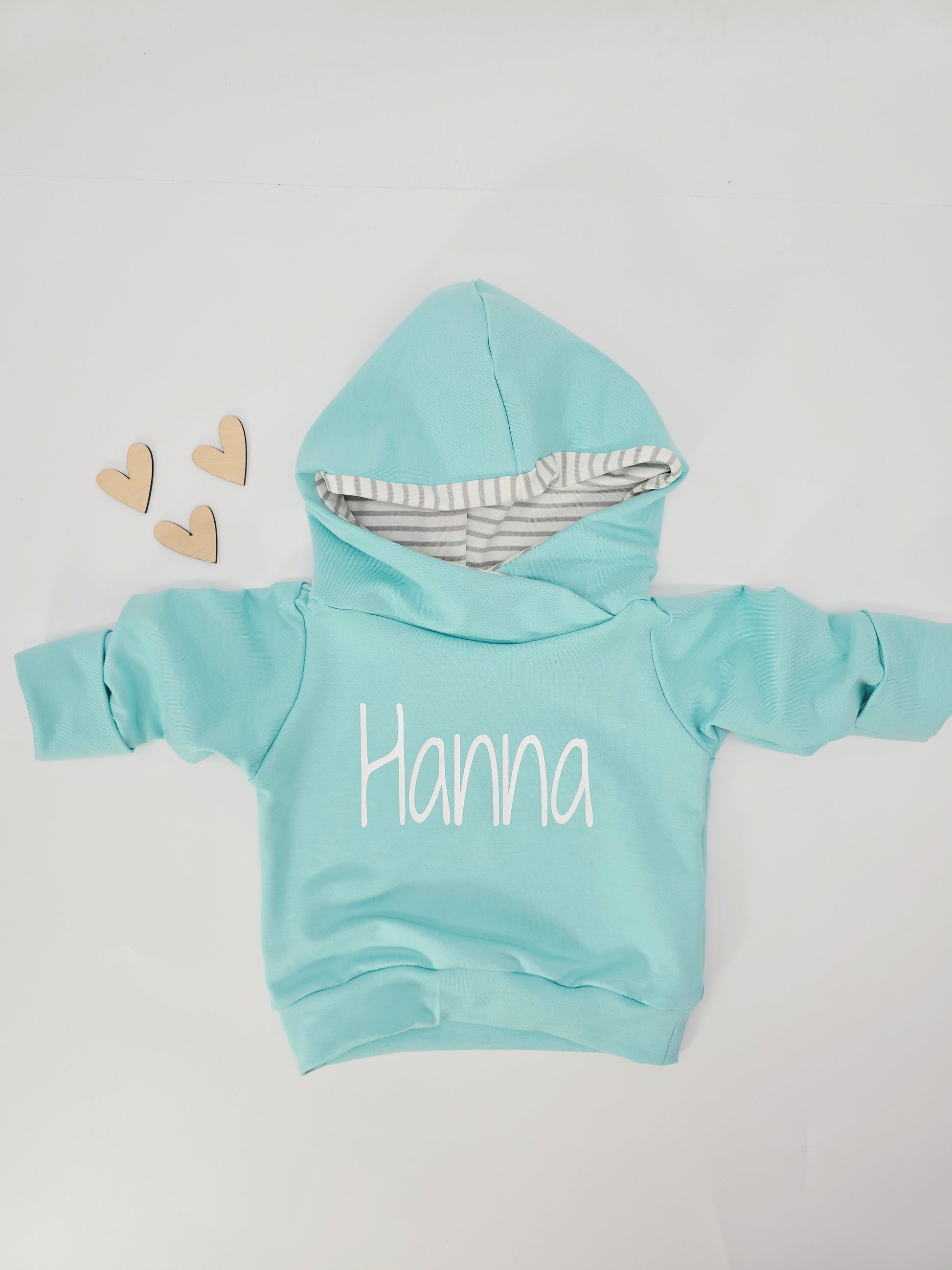 Individuell personalisierbarer Hoodie für Babys und Kinder in verschiedenen Farben erhältlich. 