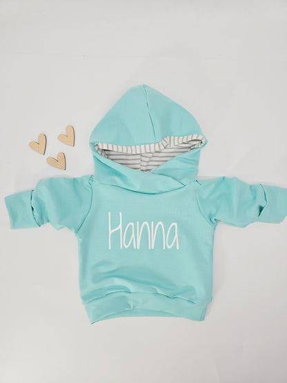Individuell personalisierbarer Hoodie für Babys und Kinder in verschiedenen Farben erhältlich. 