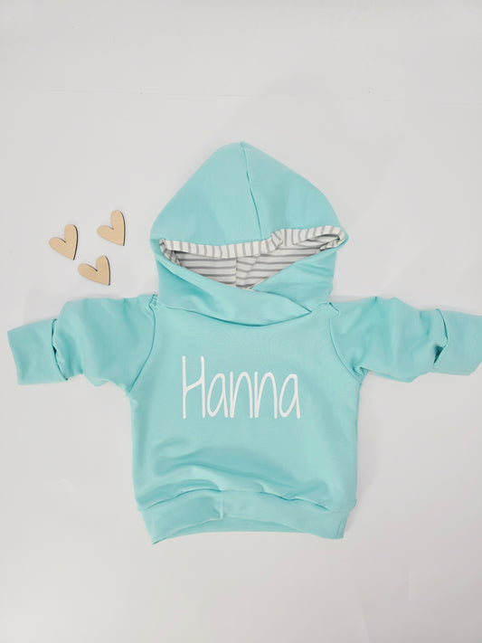 Individuell personalisierbarer Hoodie für Babys und Kinder in verschiedenen Farben erhältlich. 