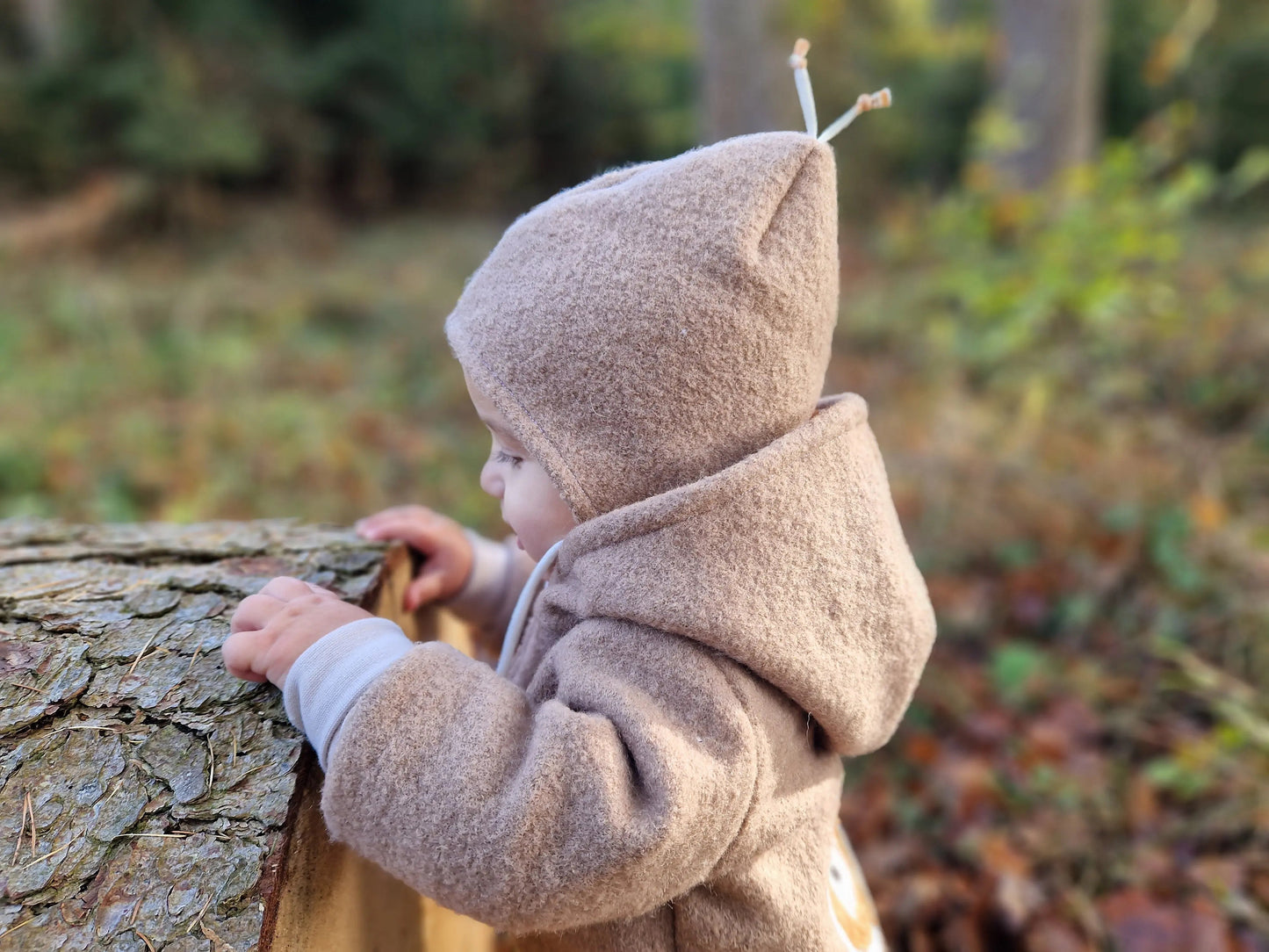 gefütterte Mütze aus Walk für Babys und Kinder, inkl. Bindeband. 