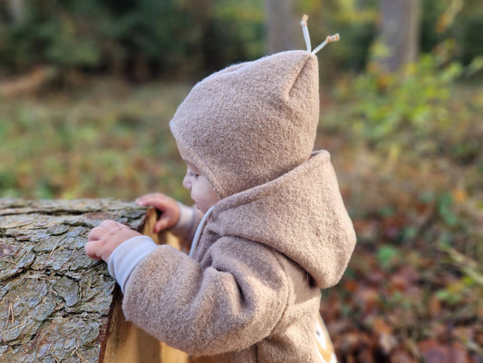 gefütterte Mütze aus Walk für Babys und Kinder, inkl. Bindeband. 